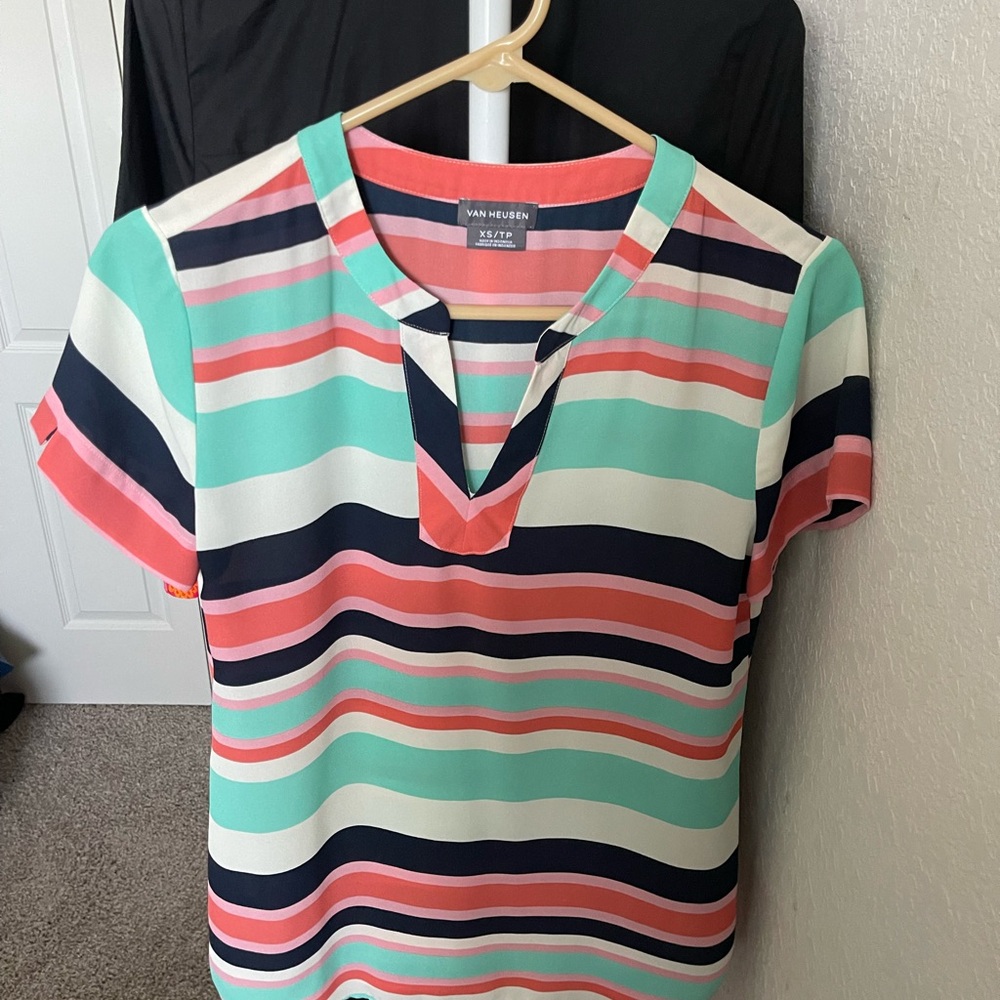 I don't use it anymore and it's in good condition. Shirt Van,  size XS